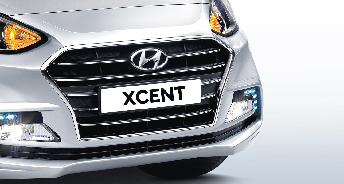 Radiator grille with Xcent logo