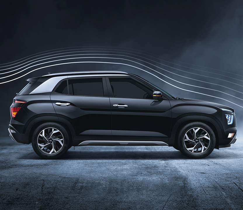 Side view of silver Creta with sound wave graphic on the background
